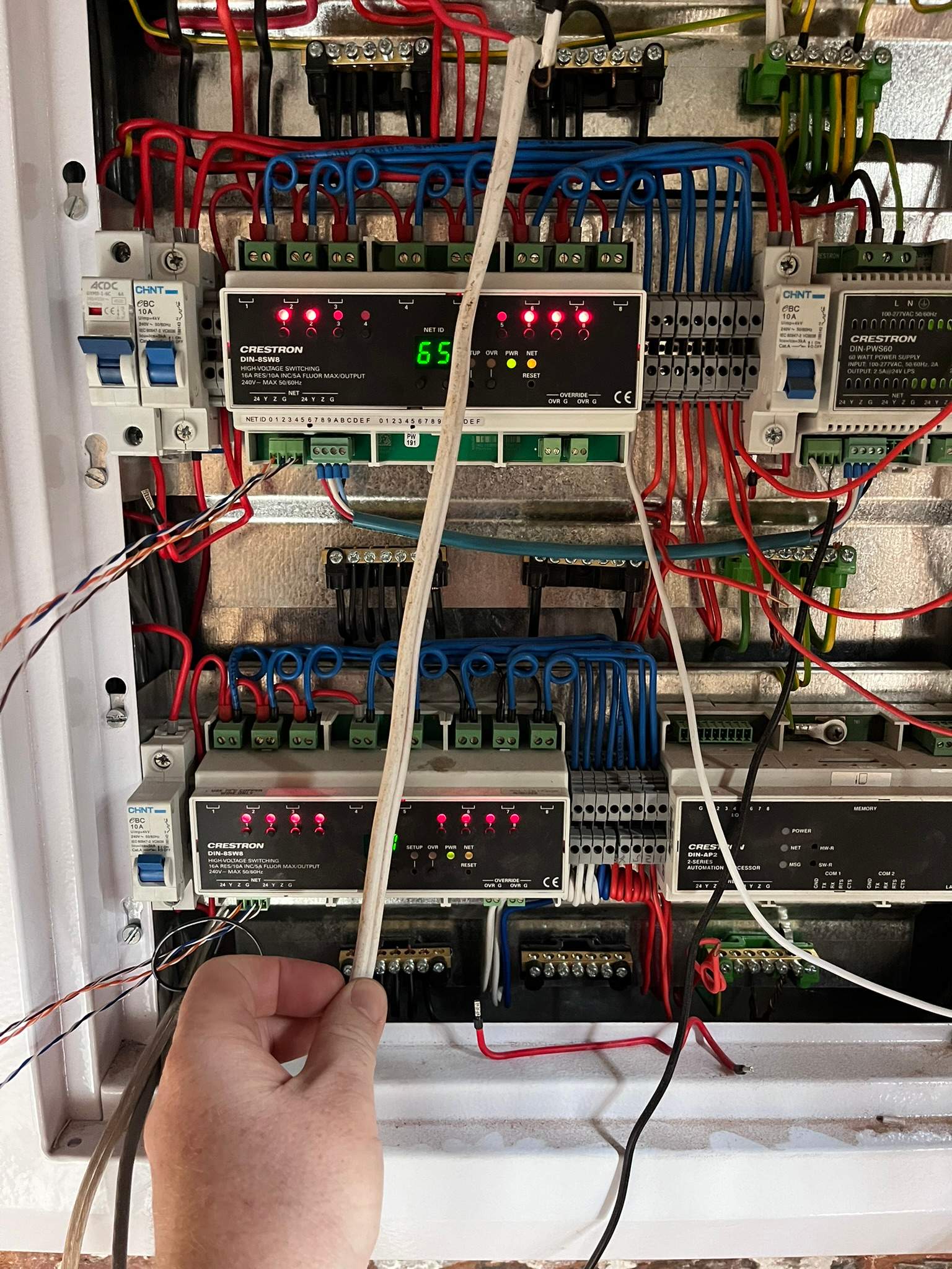 Neatly wired Crestron lighting control distribution board