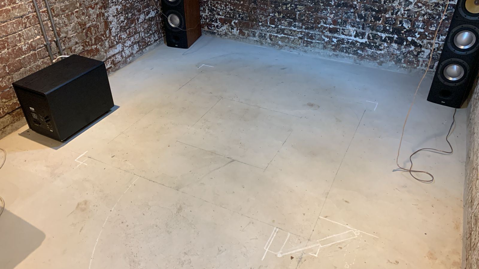 Speaker and subwoofer positions planned before furniture was built